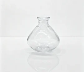 Home product 04 flat round bottle — GlazCan glass packaging